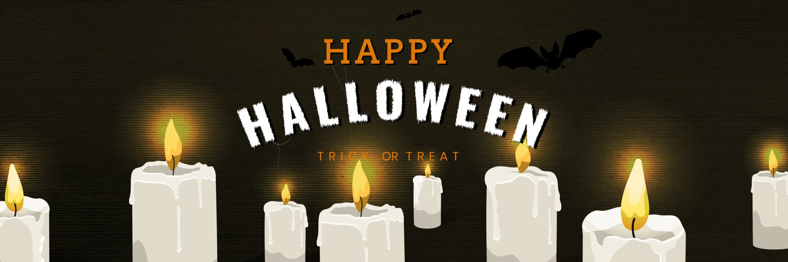 Black background with the text HAPPY HALLOWEEN TRICK OR TREAT above lit candles